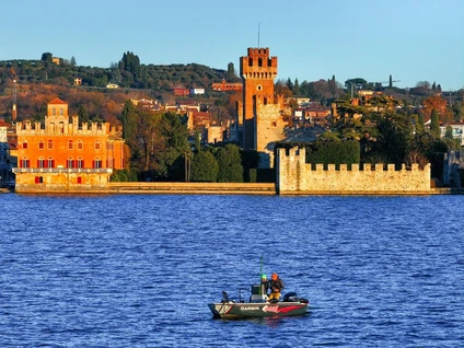 Fishing for sardines from the motorboat on Lake Garda at sunset 5